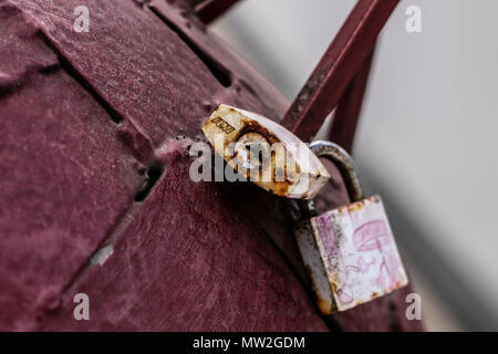 photo of padlocks in macro that symbolize union red color Stock Photo