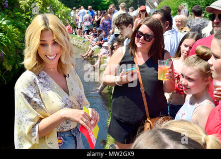 Stacey Solomon - singer and television presenter - in Loose Village, Kent, presenting from the Loose Village Duck Race for ITV's Loose Women, Bank Hol Stock Photo