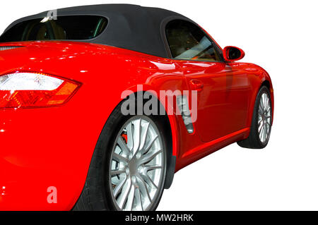 Isolated photo of a Red convertible Porsche. Seen at the 2006 Detroit auto show. More car photos available in my gallery. Stock Photo