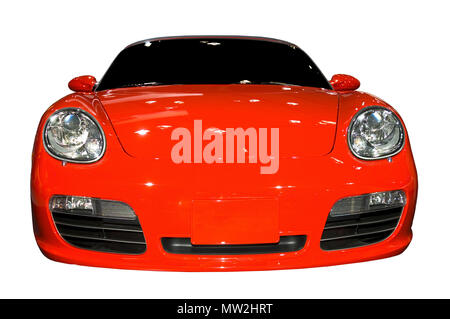 Red Porsche Boxster sports car isolated on a white background. Seen at the 2006 Detroit auto show, many more cars in my gallery. Stock Photo