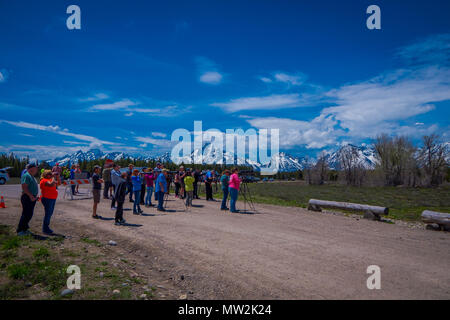 YELLOWSTONE, MONTANA, USA MAY 24, 2018: Unidentified people most them photographers taking pictures and enjoying the landscape of Grand Teton National Park, Wyoming Stock Photo