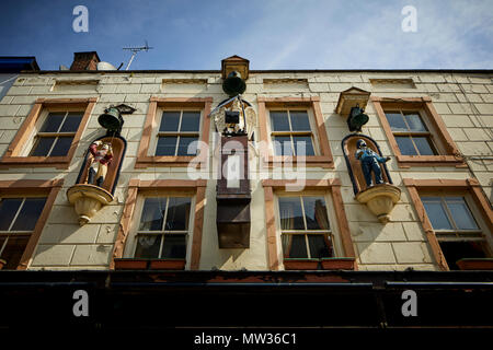 Stockport Town centre's Little Underbank Winter's Wine Bar with its ornate clocks on the exterior Stock Photo