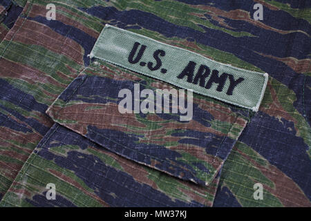 KIEV, UKRAINE - Sept 12, 2016. US ARMY branch tape on tiger stripe camouflage uniform Stock Photo