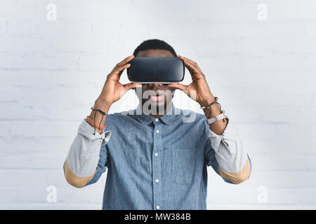 Handsome african american man wearing vr glasses Stock Photo