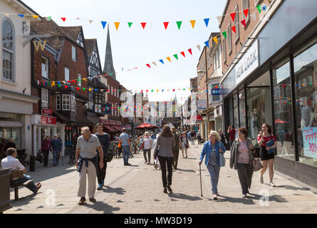 Busy pedestrianised shopping street in town centre, High Street, Salisbury, Wiltshire, England, UK Stock Photo