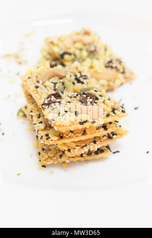 Cereal cracker on white dish Stock Photo