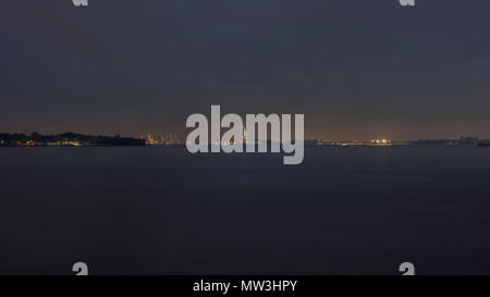 Statue of Liberty at night from Brooklyn Bridge Park, 2018. Stock Photo