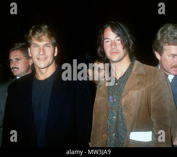 WESTWOOD, CA - JULY 10: (L-R) Actors Patrick Swayze and Keanu Reeves attend the premiere of 'Point Break' on July 10, 1991 at Avco Center Theater in Westwood, California. Photo by Barry King/Alamy Stock Photo Stock Photo