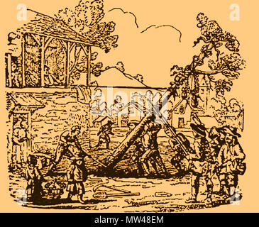Erecting a May Pole in Medieval times - May Day celebrations in Britain, were often accompanied by bonfires, dancing around maypoles and the election of a May Queen Stock Photo