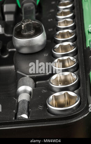 Assorted ratchet sockets inside a toolbox Stock Photo