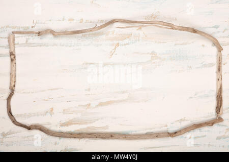 weathered branches  on old vintage style textured blue and white wood background , close up view with copy space Stock Photo