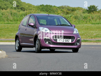 2012 Peugeot 107 compact city car Stock Photo - Alamy