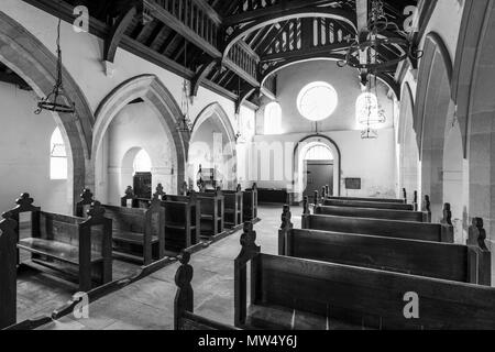 Interior b & w of historic St Martin's Church with wooden pews, aisle & hammerbeam roof in nave -  Allerton Mauleverer, North Yorkshire, England, UK. Stock Photo