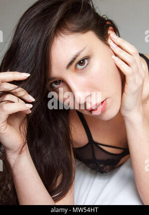 Italian woman with brown hair and eyes and full red lips Stock Photo