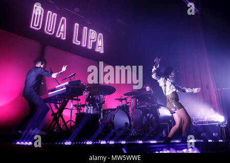Dua Lipa dancing live onstage during the European leg of her 2017 US and Europe Tour. She is backed by her three-man live band. Dua Lipa live, Dua Lipa singer, Dua Lipa pop star. Stock Photo