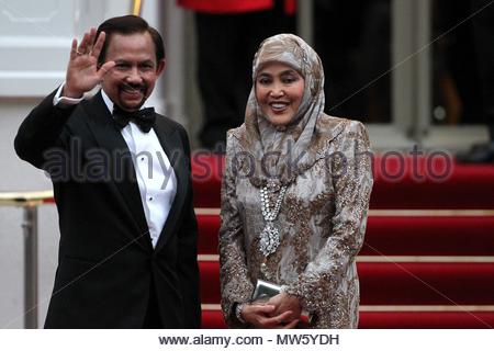 Sultan Hassanal Bolkiah of Brunei (C) and his wife Pengiran Anak Stock ...