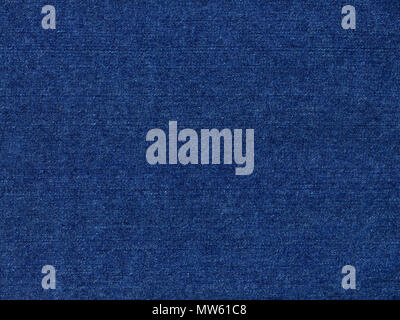 Dark blue denim fabric texture close-up. High resolutions scan. Ideal for use as a background texture or wallpaper. Stock Photo