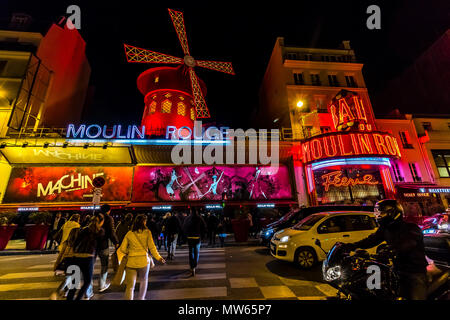 People heading towards he Moulin Rouge for a night out ,Boulevard de Clichy, Pigalle ,Paris Stock Photo