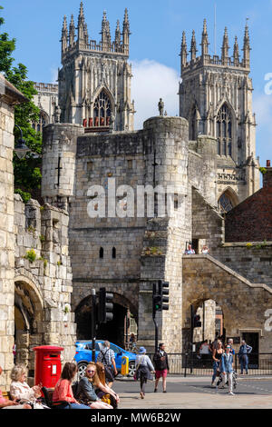 Sunlight on the Magnesian limestone of Bootham Bar and York MInster, Exhibition Square, York, UK Stock Photo