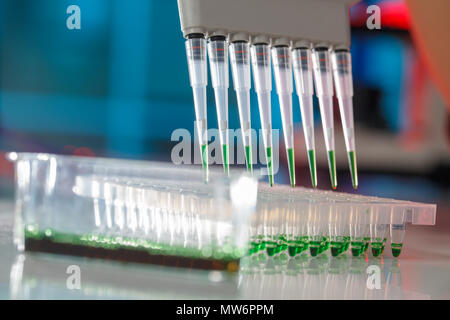 electrophoresis device in a genetics lab to decrypt the genetic code Stock Photo