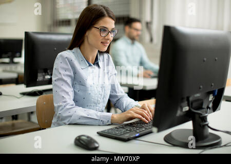 Young couple learning in the classroom Stock Photo