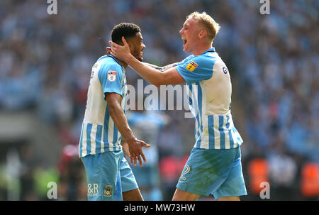 Coventry City's Jordan Willis (left) and Coventry City's Jack Grimmer (right) celebrate after the game Stock Photo