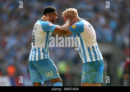 Coventry City's Jordan Willis (left) and Coventry City's Jack Grimmer (right) celebrate after the game Stock Photo