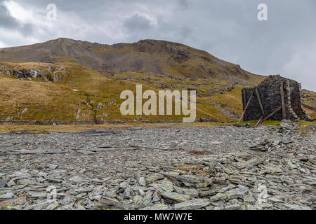 The now disused site of the former Croesor Slate Quarry with the summit of Moelwyn Mawr in the Background, Snowdonia National Park Stock Photo