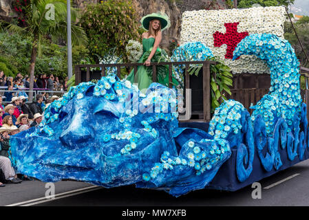 Festival float during the main Madeira Flower Festival parade Stock Photo