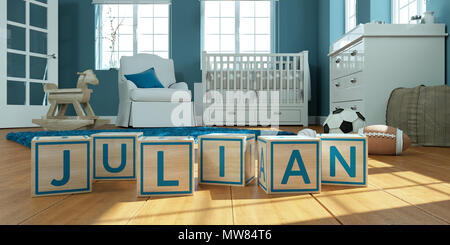 The name julian written with wooden toy cubes in children's room Stock Photo