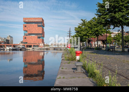 View on the MAS museum reflected in a dock (Willemdok) in Antwerp Stock Photo