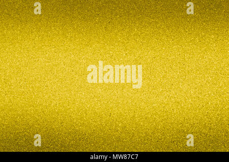 Granite background of golden color with small dots. Darkening from the top and bottom. Stock Photo