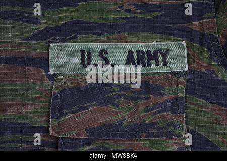 KIEV, UKRAINE - Sept 12, 2016. US ARMY branch tape on tiger stripe camouflage uniform Stock Photo