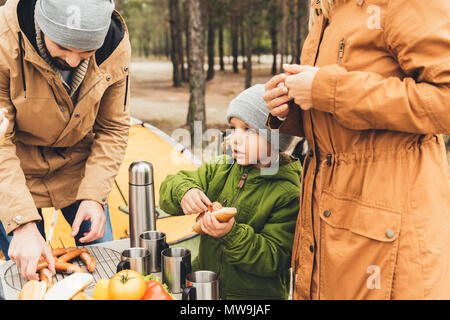 family having picnic on cold autumn day Stock Photo