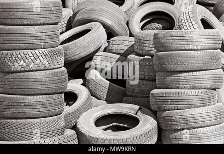 Old worn and used tires ready for recycling Stock Photo