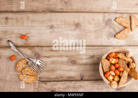 Gray textile napkin on a wooden table. place for text. Copy space. Flat lay Stock Photo