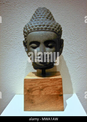 . head of Buddha. Sandstone . Camw 109 Cambodia-buddha-11thcentury-fix2 Stock Photo