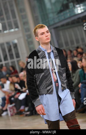 A model walks the runway at the Martine Rose show during London