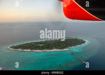 View of Maldives seaplaned of the Maldivian Air Taxi airline from Male, Aerial airborne view of islands and atolls within the Maldives, Indian Ocean.  Stock Photo