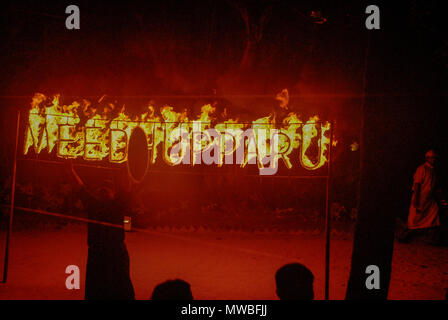 Flaming letters displaying name of island - Meedhupparu, Maldives Stock Photo