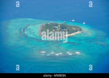 View of Maldives seaplaned of the Maldivian Air Taxi airline from Male, Aerial airborne view of islands and atolls within the Maldives, Indian Ocean.  Stock Photo