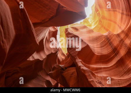 The sandstone inside Antelope Canyon seems to sparkle in the sunlight Stock Photo