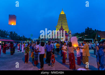 Kanchanaburi, Thailand - September 16, 2016: Buddhist Mon people celebrate the month of merit festival at Pagoda of Bodhgaya in Sangkhlabri, Kanchanab Stock Photo