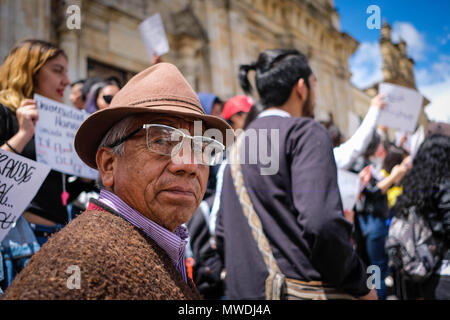 Bogota, Colombia. 31st May, 2018. A man in typical clothing joins the demonstration. After the presidential elections in Colombia on May 27, some alterations have been found in the formats of vote counting. The total numbers of votes have been altered to give more votes to certain candidates. On May 31, a march was organized to demand that the National Registry of Colombia act in this regard. Credit: SOPA Images Limited/Alamy Live News Stock Photo