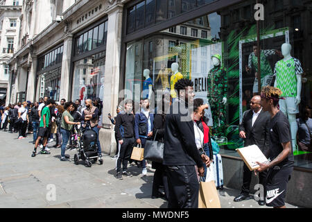 London, UK. 1st June, 2018. Fans of the Super Eagles, the Nigerian national football team, queue outside Nike's flagship store in Oxford Street to buy football kits for the forthcoming FIFA 2018 World Cup. The Nigerian Football Federation revealed that over three million pre-orders had been received for the kit and kits are understood to have sold out online. Credit: Mark Kerrison/Alamy Live News Stock Photo