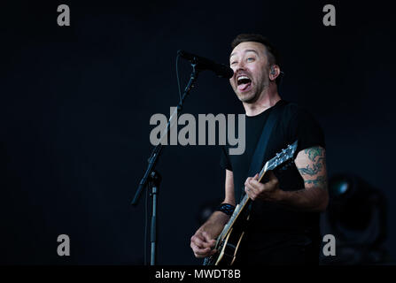 01 June 2018, Germany, Nuremberg: Singer Tim McIlrath of the band 'Rise Against' performs at the music festival 'Rock im Park', which runs until 03 June 2018. Photo: Nicolas Armer/dpa Stock Photo