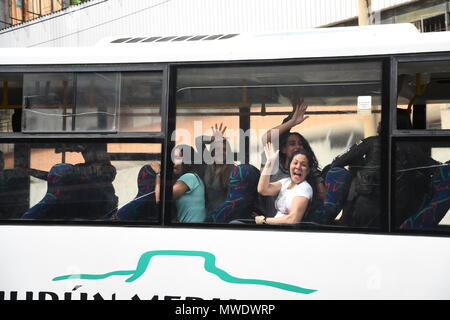 Political prisoners wave at their relatives outside Helicoide in Caracas as they were being put on the bus to leave from the prison.  The Government of Venezuela grants precautionary measures to political prisoners who were detained at the headquarters of the Bolivarian Intelligence Service (SEBIN). 39 political prisoners were released with precautionary measures by the government of Nicolas Maduro. Still more than 150 people continue behind bars for having participated in protests against the government. Among those released is the former Mayor of San Cristobal, state tachira, Daniel Ceballos Stock Photo