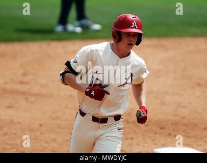 Jun 2, 2018: Arkansas left fielder Heston Kjerstad #18 moves over under a  fly ball hit towards him. Arkansas defeated Southern Miss 10-2 in the NCAA  Fayetteville Baseball Regional at Baum Stadium