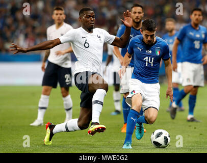 Nice, France competes with Jorge Luiz Jorginho of Italy during a World Cup warm-up in Nice, France.  1st June, 2018. Paul Pogba (L, front) of France competes with Jorge Luiz Jorginho of Italy during a World Cup warm-up in Nice, France on June 1, 2018. France won 3-1. Credit: Federico Simoni/Xinhua/Alamy Live News Stock Photo