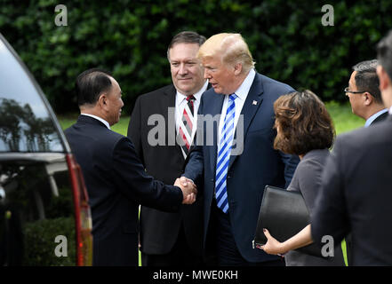Washington, USA. 1st June 2018. US President Donald Trump shakes hands with Kim Yong Chol, former North Korean military intelligence chief and one of leader Kim Jong Un's closest aides, as Secretary of State Mike Pompeo looks on outside the Oval Office of the White House in Washington on Friday, June 1, 2018. Credit: Olivier Douliery/Pool via CNP /MediaPunch Credit: MediaPunch Inc/Alamy Live News Stock Photo